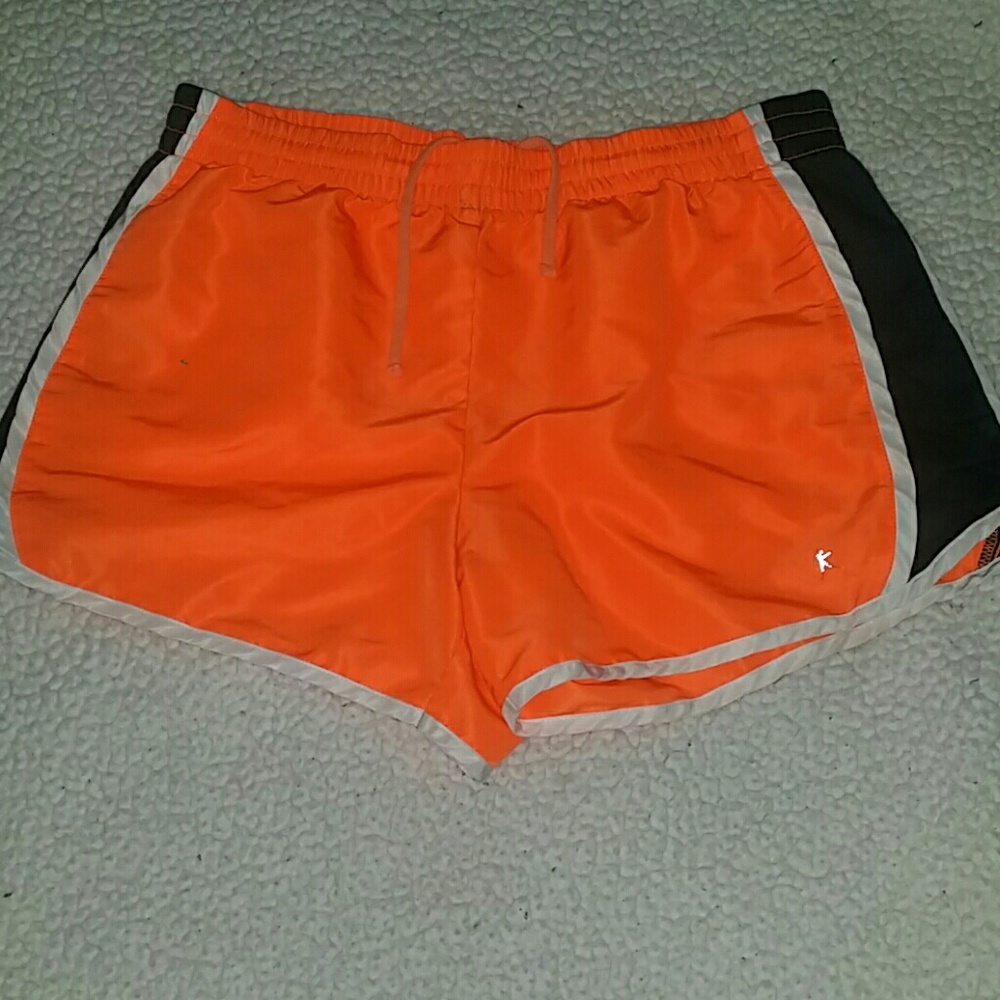 Neon orange athletic shorts